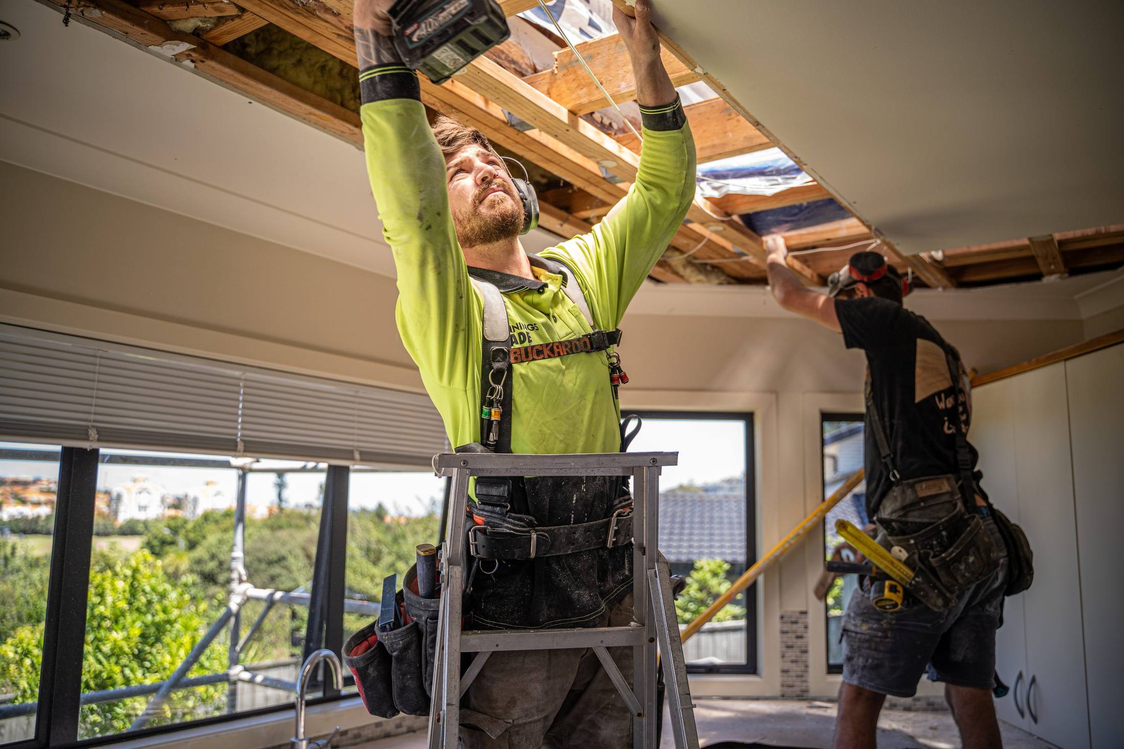 Coldicutt Blackman builders stripping out a ceiling during a renovation